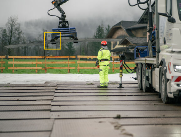 Cteam infrastructure construction using crane for material handling on temporary access mats. Cteam infrastructure construction using crane for material handling on temporary access mats.
